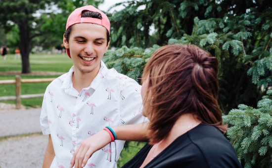 Teenage Boy with Mom Talking and Laughing